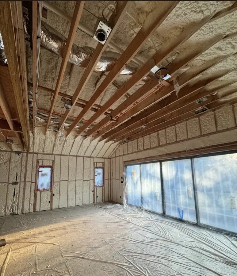 Interior walls and ceiling insulated with spray foam during new construction in Windham
